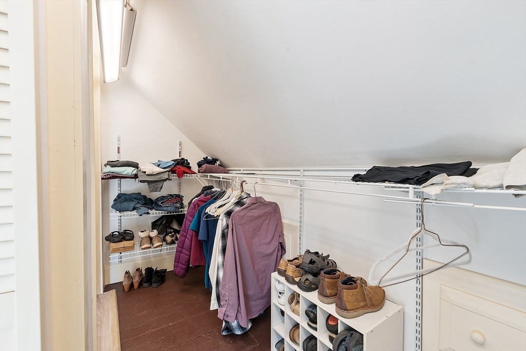 64 Central Street Gardner, MA 01440 - Photo 41 of 42 a view of walk in closet with clothes and shoes