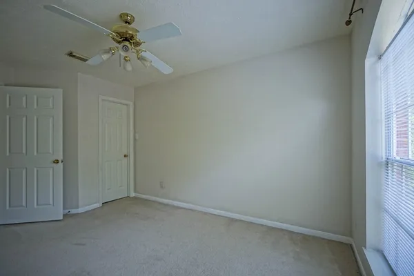 en empty room with a window