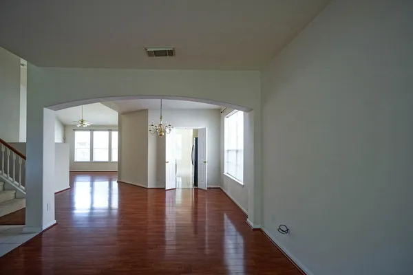 a view of gallery with wooden floor