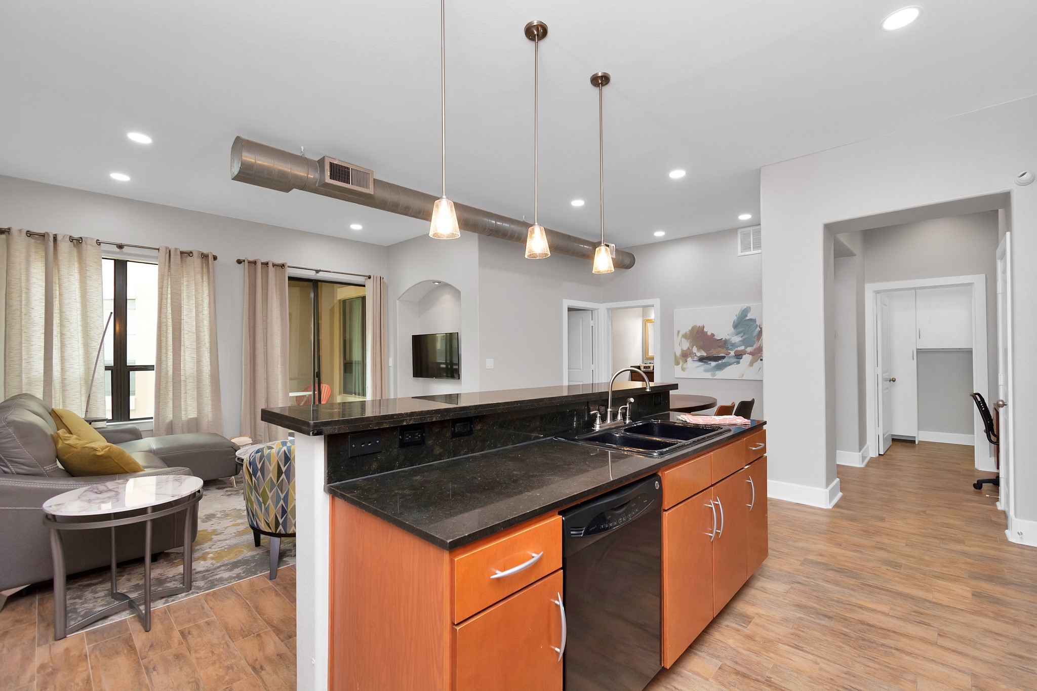 1901 Post Oak Boulevard, Unit 3113 Houston, TX 77056 - Photo 7 of 34 The fairly open concept of the kitchen and living room allows for a seamless flow of conversation and entertainment.