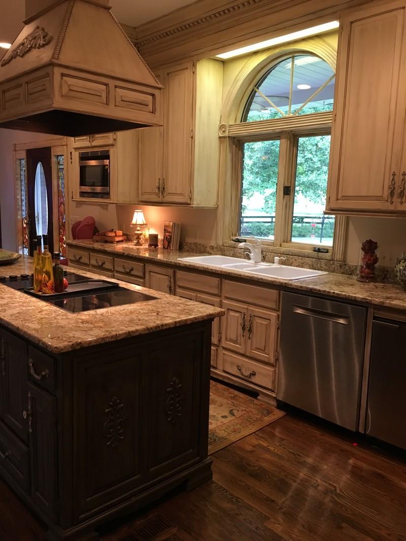 4528 Harpeth School Road Franklin, TN 37064 - Photo 14 of 19 a kitchen with stainless steel appliances a sink stove and cabinets