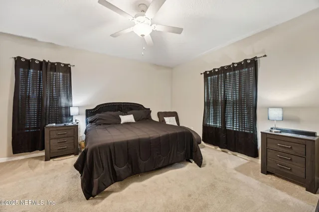 a bedroom with a bed and a closet