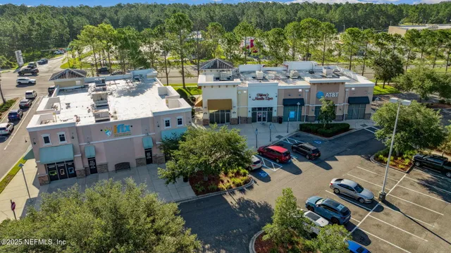 an aerial view of a city with lots of residential buildings