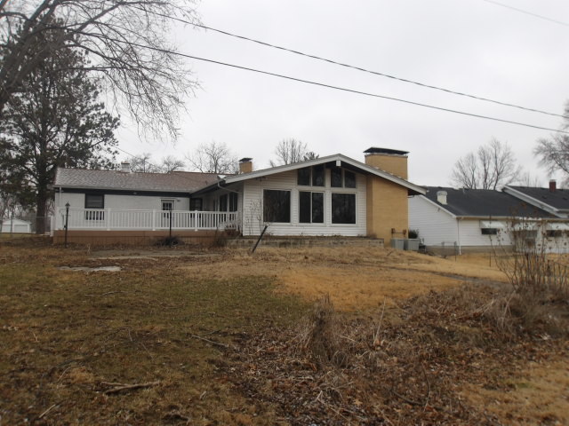 13 Southern Drive Decatur, IL 62521 - Photo 26 of 29 a front view of a house with a garden