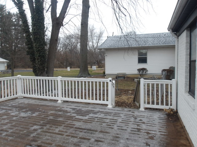 13 Southern Drive Decatur, IL 62521 - Photo 28 of 29 a view of outdoor space with deck and kitchen