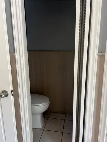 a bathroom with a sink and toilet