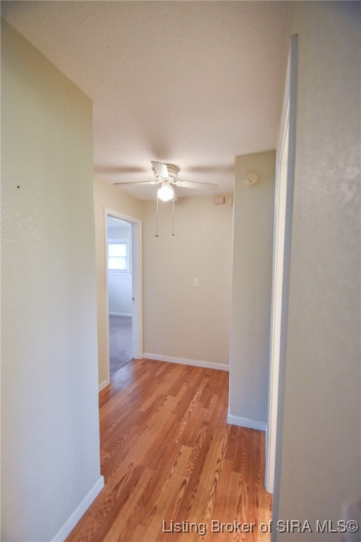 139 Factory Drive Austin, IN 47102 - Photo 20 of 51 Hallway leading to primary bath and 3 bedrooms