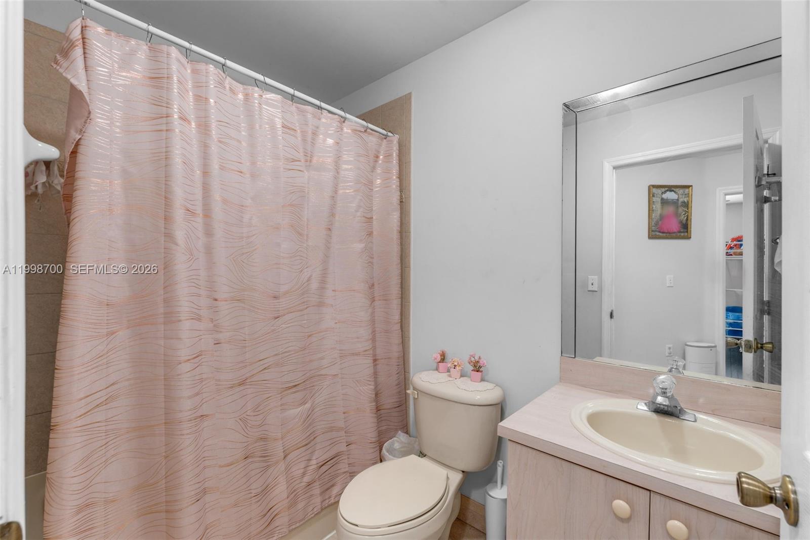 13471 Southwest 278th Terrace Homestead, FL 33032 - Photo 16 of 32 a bathroom with a sink toilet and shower