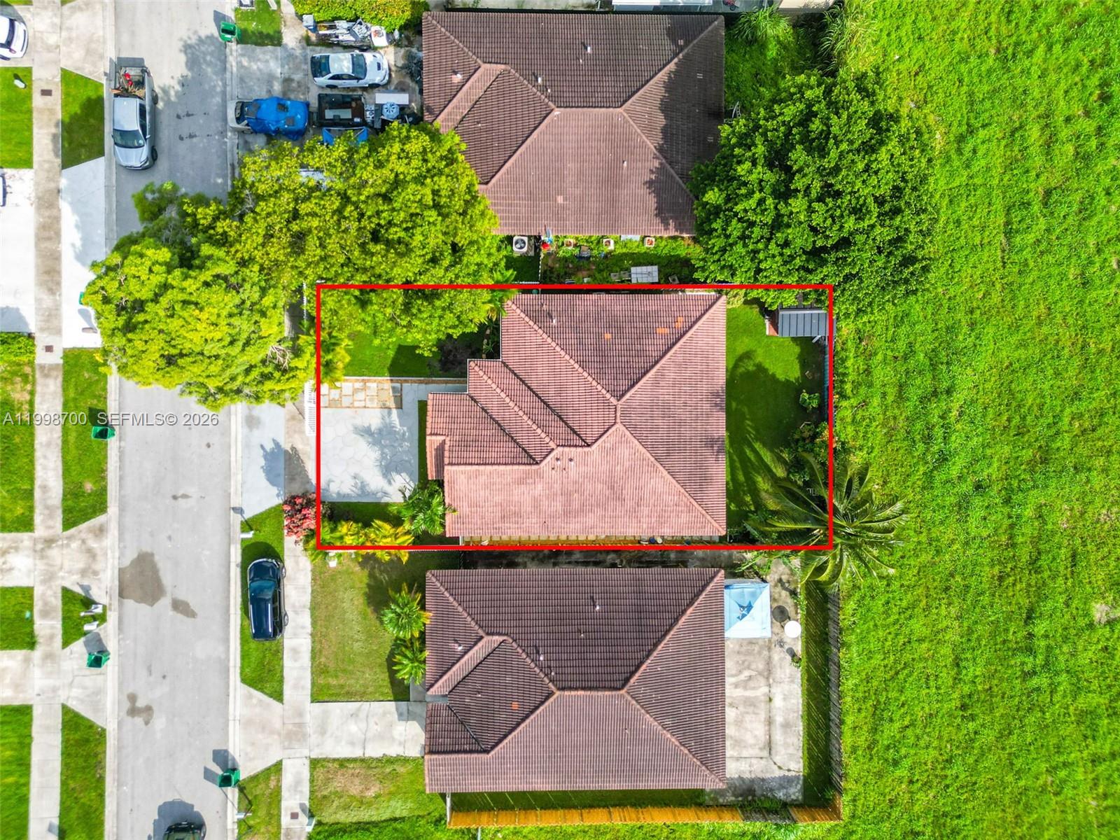 13471 Southwest 278th Terrace Homestead, FL 33032 - Photo 5 of 32 an aerial view of a house with a yard basket ball court and outdoor seating
