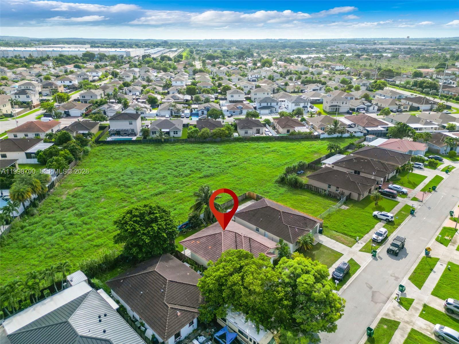 13471 Southwest 278th Terrace Homestead, FL 33032 - Photo 9 of 32 an aerial view of multiple house