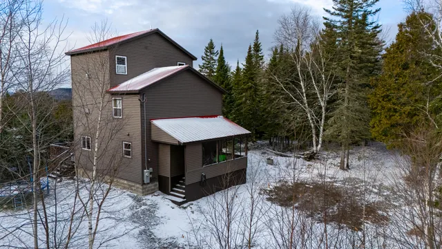 $459,000 | 80 Wilsons Mills Road, Oquossoc, ME 04964