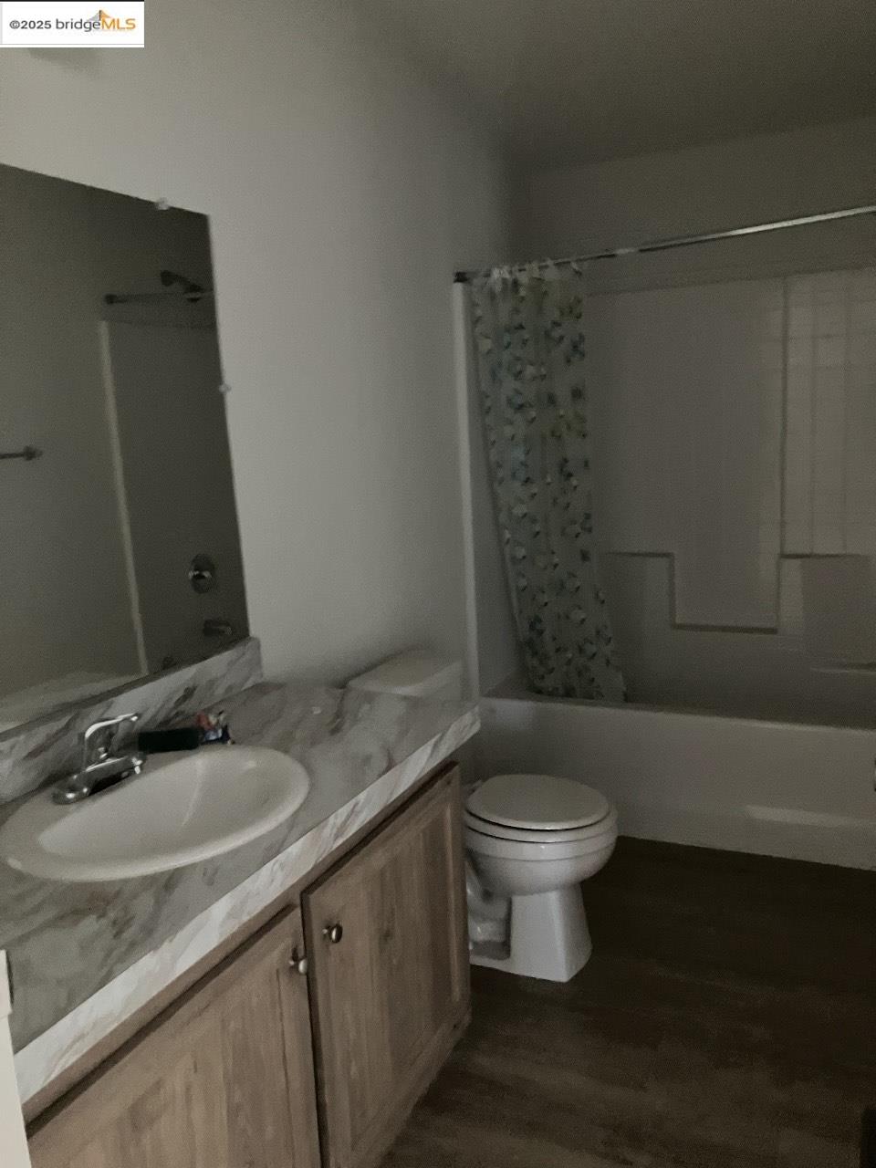 1000 2nd Garrotte Ridge Road Groveland, CA 95321 - Photo 11 of 20 a bathroom with a granite countertop sink a toilet a mirror and shower