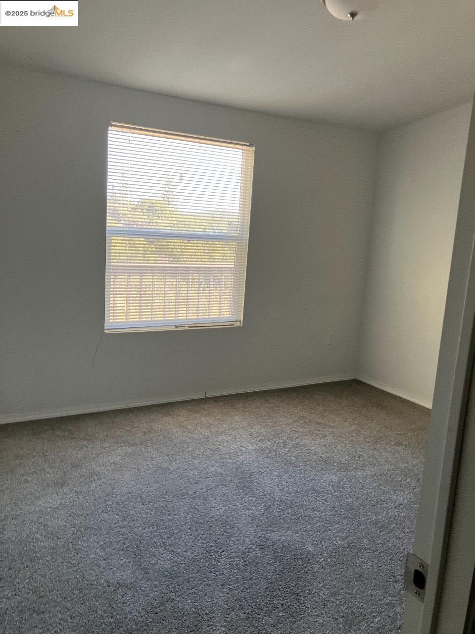1000 2nd Garrotte Ridge Road Groveland, CA 95321 - Photo 14 of 20 an empty room with a window