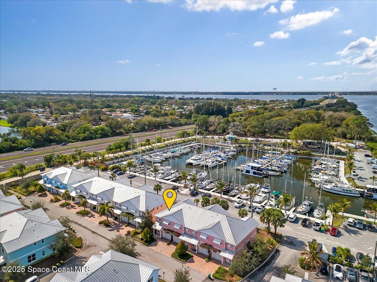 2730 Cutlass Point Lane, Unit 101 Merritt Island, FL 32953 - Photo 29 of 31 an aerial view of a city