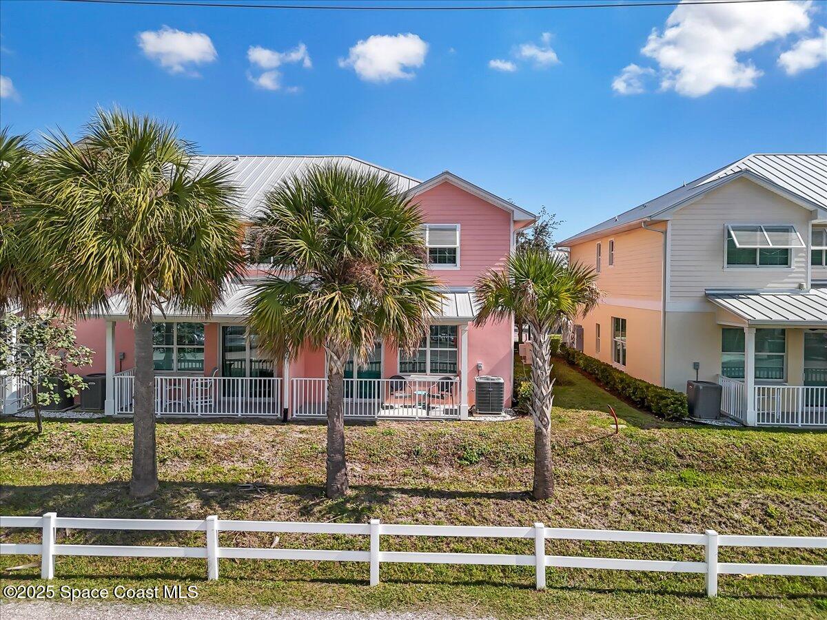 2730 Cutlass Point Lane, Unit 101 Merritt Island, FL 32953 - Photo 31 of 31 a view of a house with swimming pool