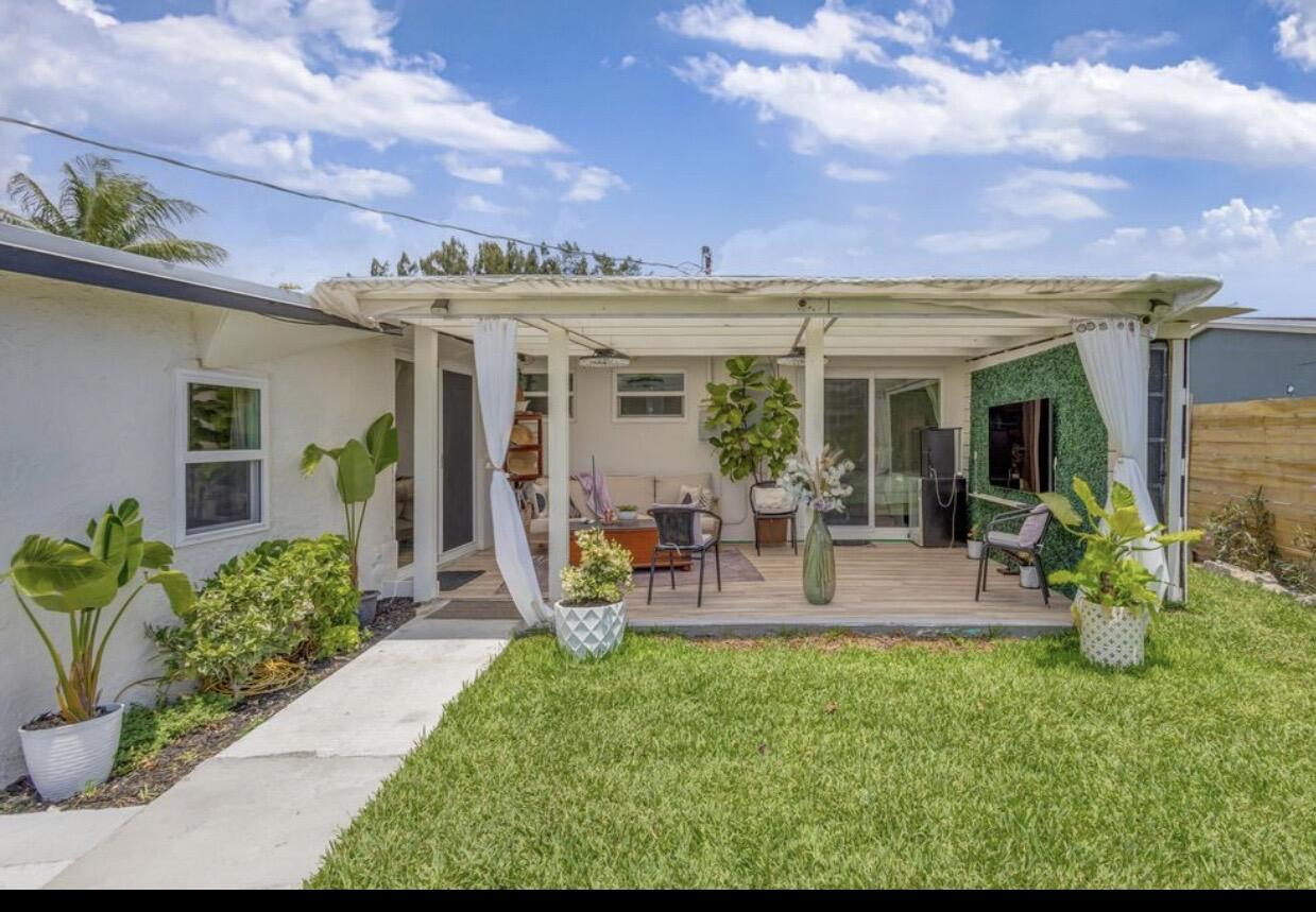 115 West 31st Court Riviera Beach, FL 33404 - Photo 15 of 21 Back Porch