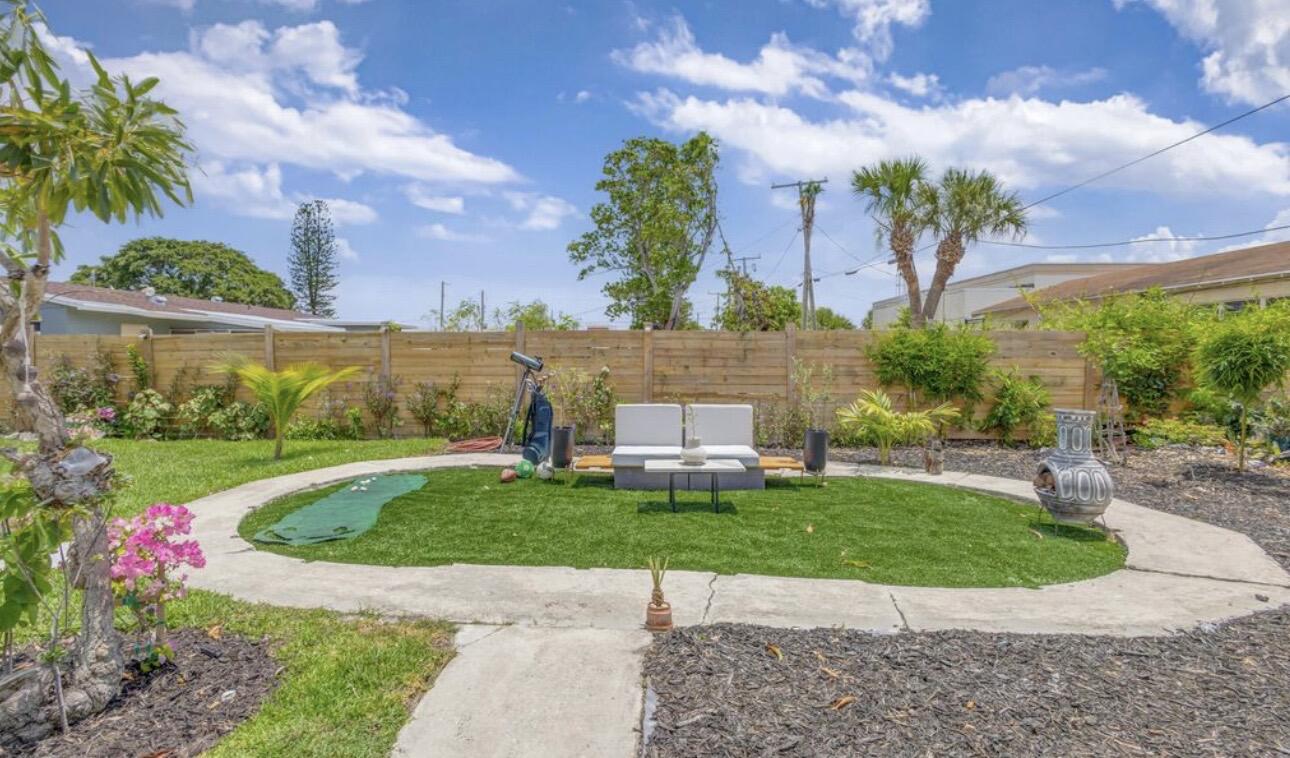 115 West 31st Court Riviera Beach, FL 33404 - Photo 16 of 21 Backyard Garden