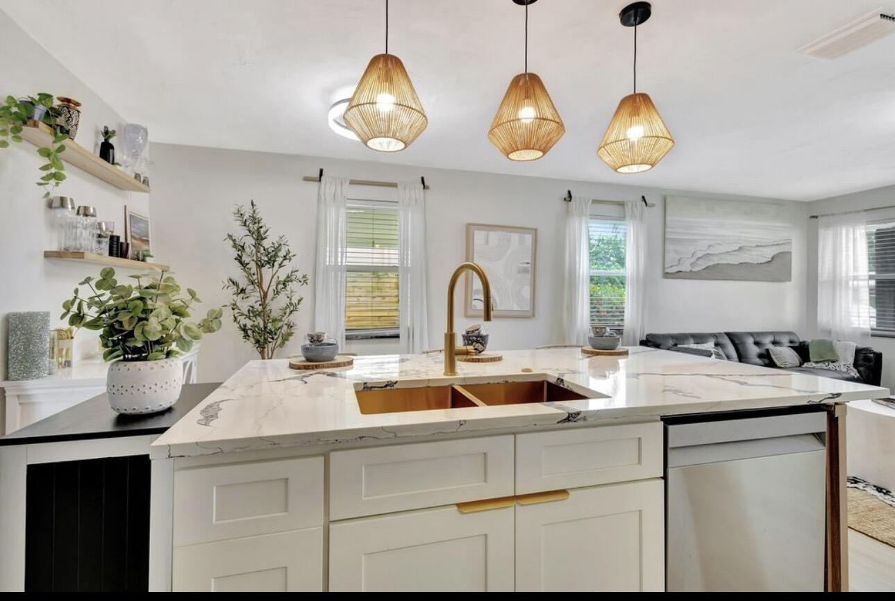 115 West 31st Court Riviera Beach, FL 33404 - Photo 3 of 21 Kitchen View Living Room