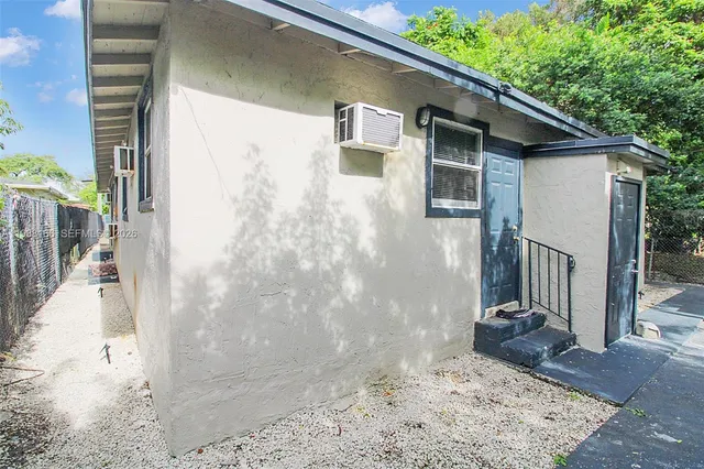 a view of a back yard of the house