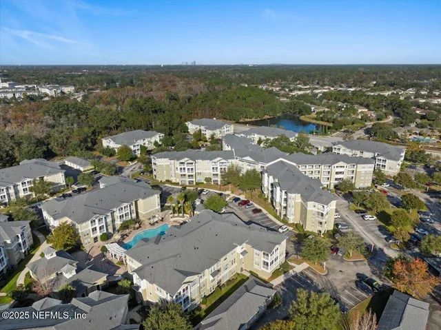 an aerial view of a city with lots of residential buildings