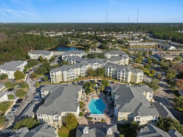 an aerial view of a city with lots of residential buildings