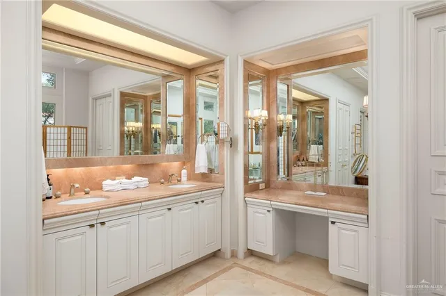 a bathroom with a sink and mirror