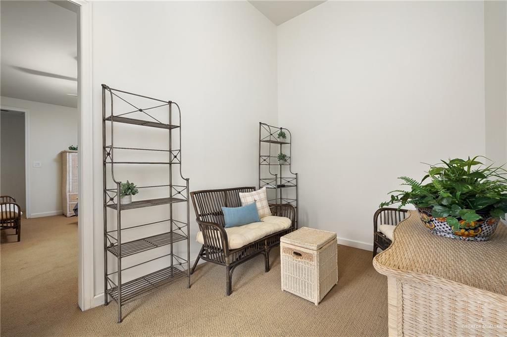 9 Old Orchard Road McAllen, TX 78503 - Photo 25 of 34 a living room with furniture and a potted plant