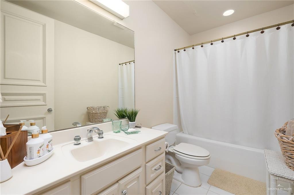 9 Old Orchard Road McAllen, TX 78503 - Photo 27 of 34 a bathroom with a sink toilet and shower