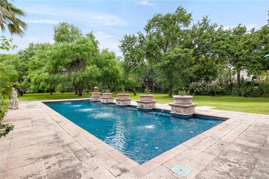 9 Old Orchard Road McAllen, TX 78503 - Photo 28 of 34 a view of a swimming pool with a patio