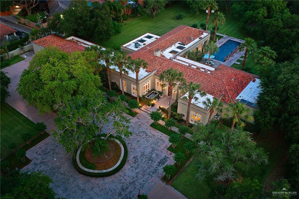 9 Old Orchard Road McAllen, TX 78503 - Photo 3 of 34 an aerial view of a house with garden space and street view