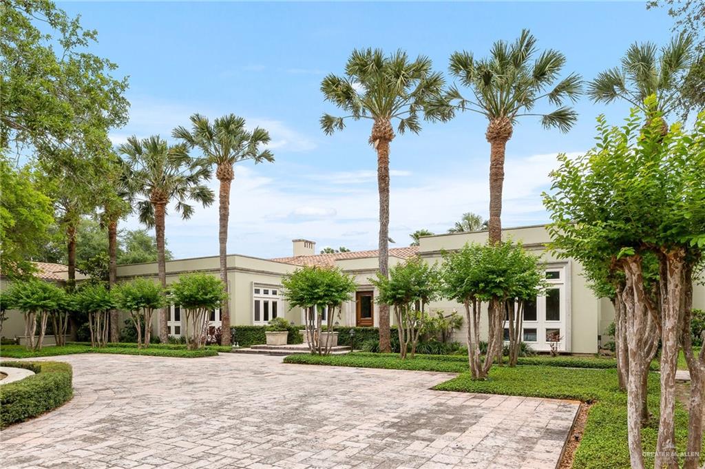 9 Old Orchard Road McAllen, TX 78503 - Photo 6 of 34 a view of a palm trees next to a yard