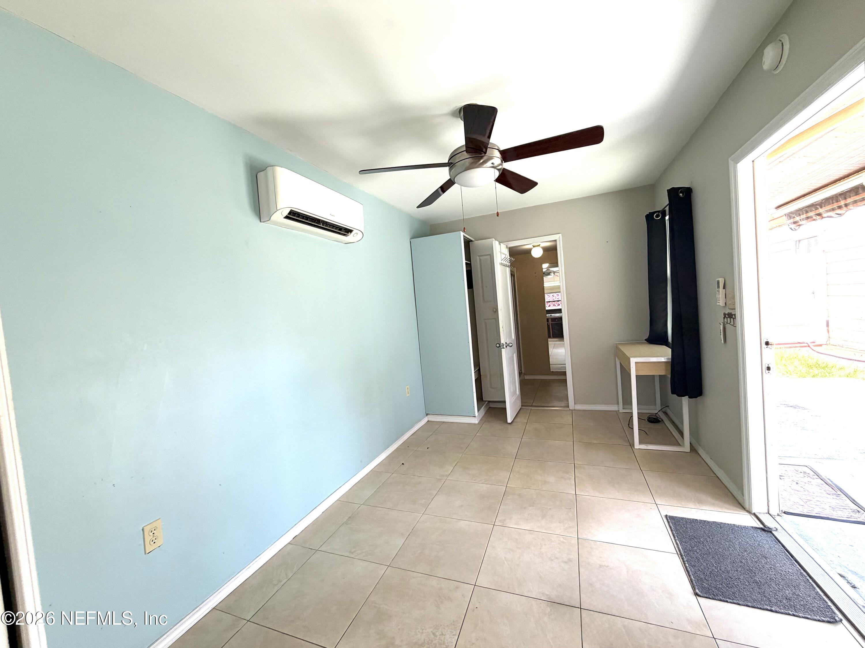 4127 Springwood Road Jacksonville, FL 32207 - Photo 55 of 63 a view of livingroom with furniture and windows