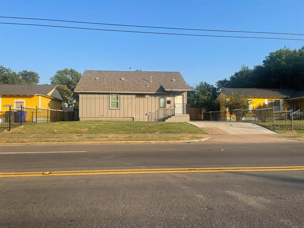 2512 East Overton Road Dallas, TX 75216 - Photo 3 of 21 a view of a house with a big yard