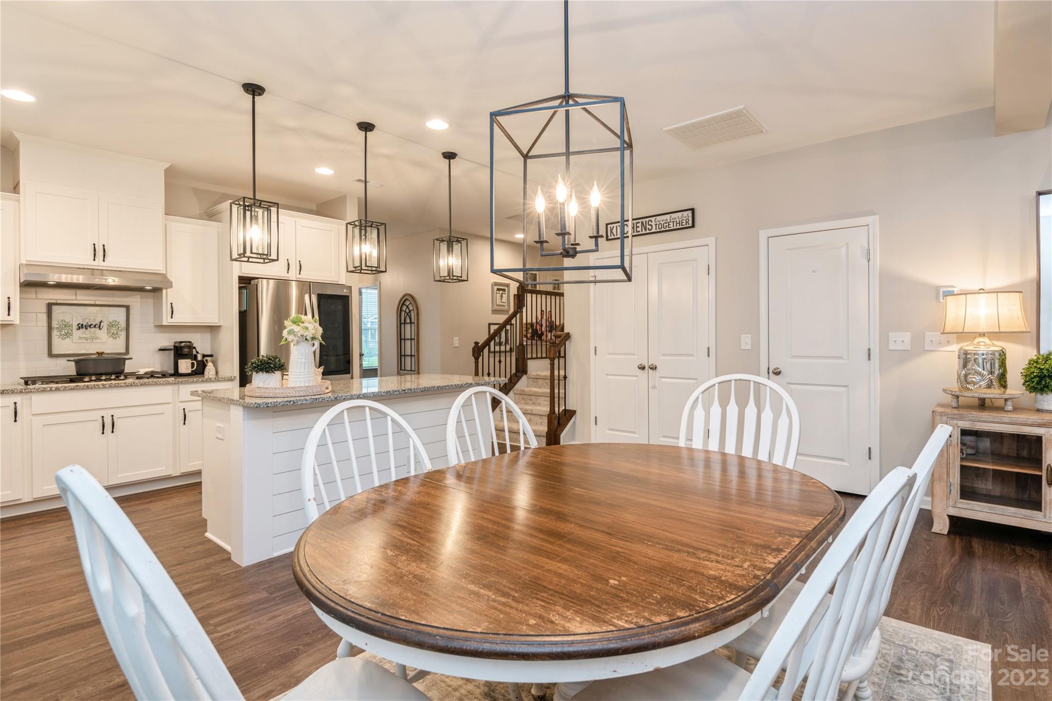 3028 Eagle Ridge Lane Indian Trail, NC 28079 - Photo 15 of 38 a view of a dining room with furniture