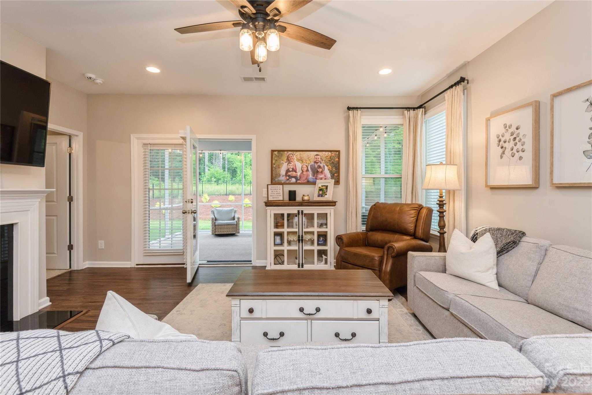 3028 Eagle Ridge Lane Indian Trail, NC 28079 - Photo 16 of 38 a living room with furniture and a flat screen tv