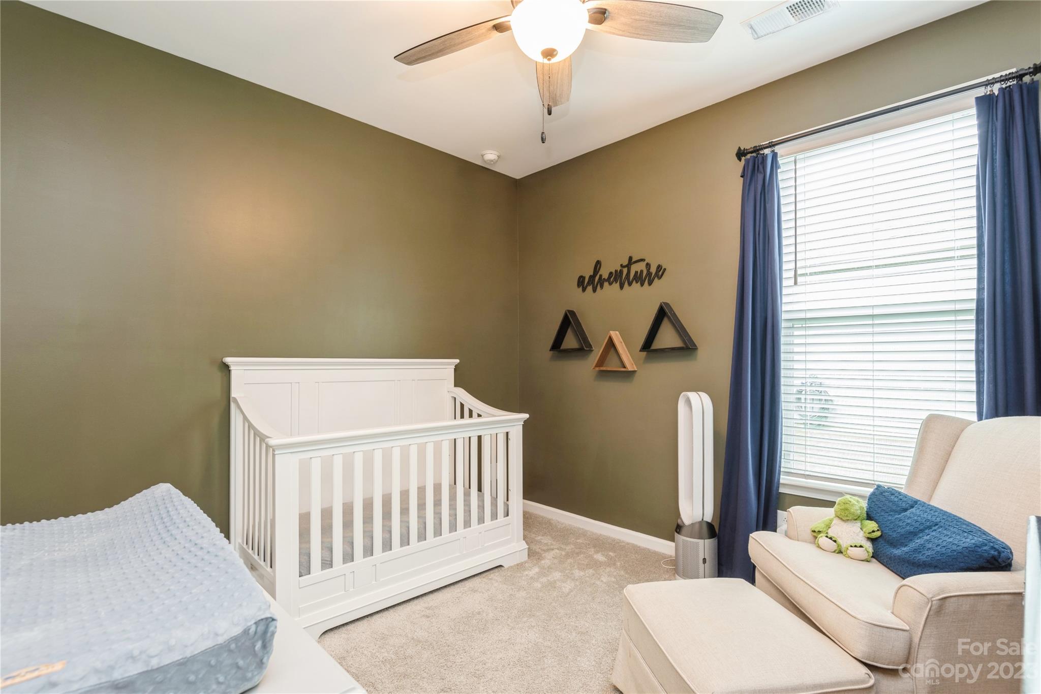 3028 Eagle Ridge Lane Indian Trail, NC 28079 - Photo 26 of 38 a bedroom with a couch and a table