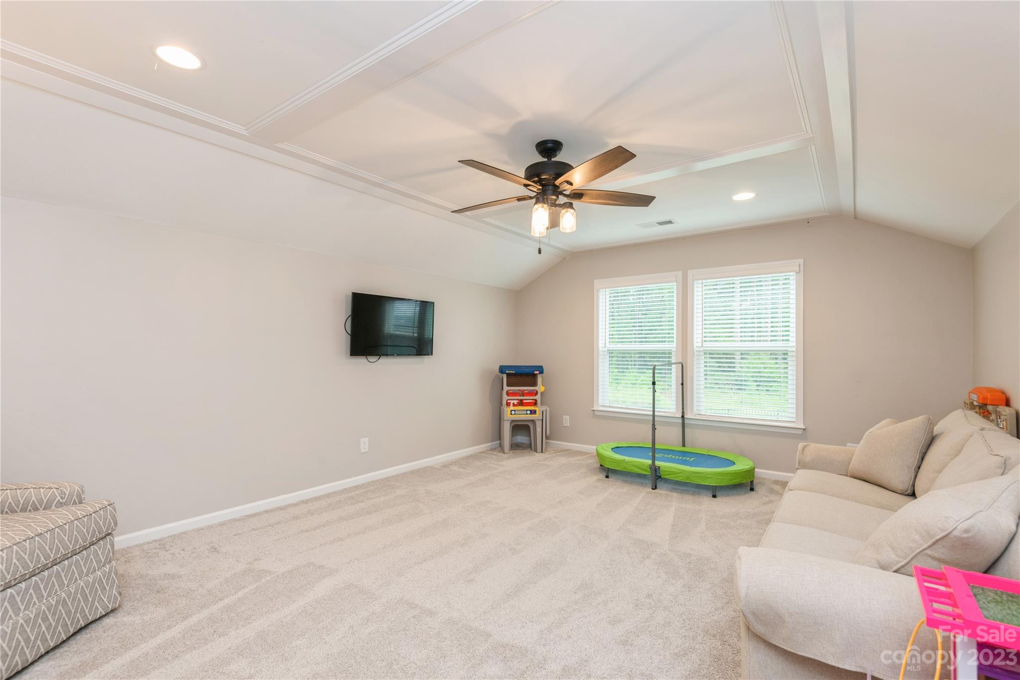 3028 Eagle Ridge Lane Indian Trail, NC 28079 - Photo 28 of 38 a living room with furniture and a window