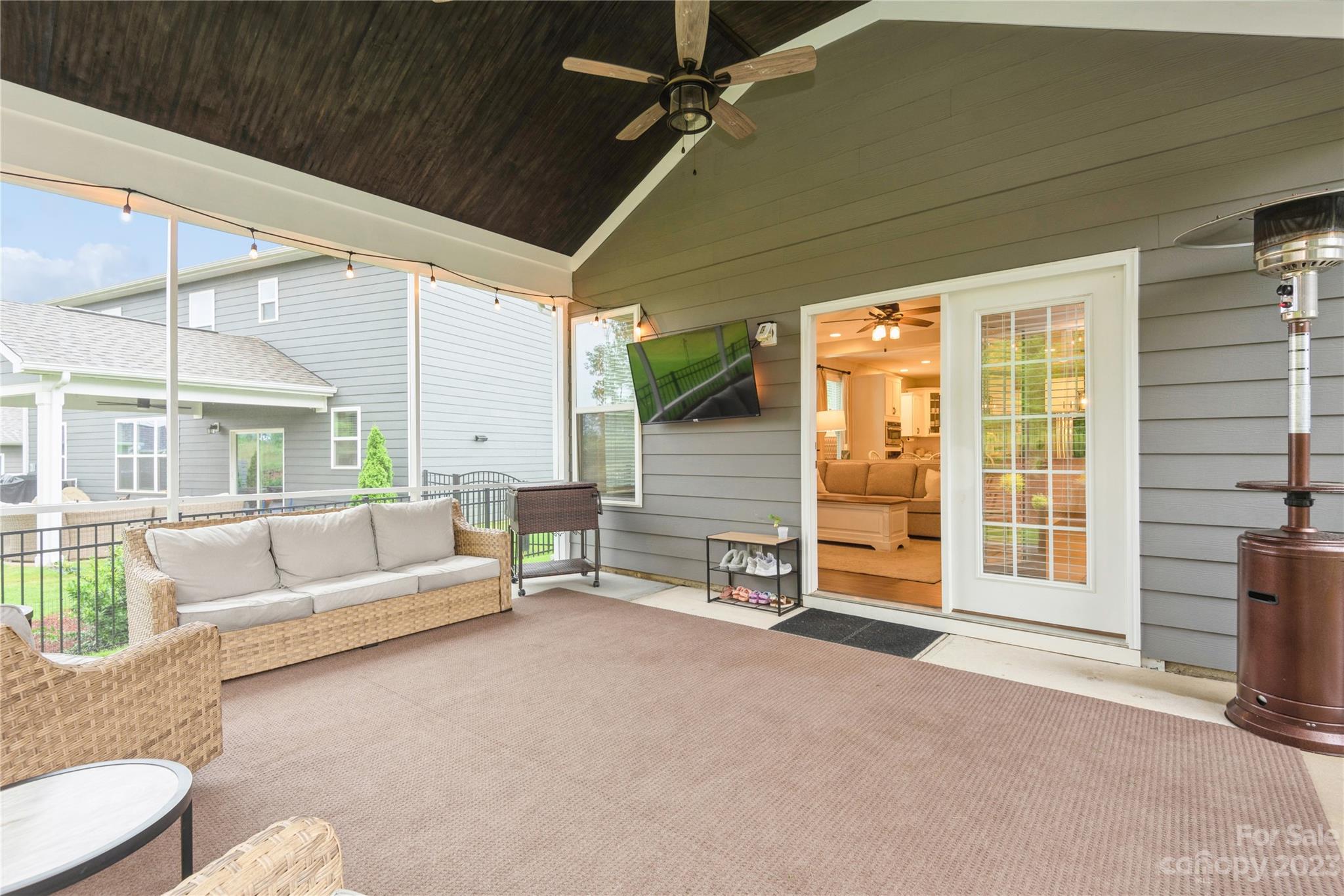 3028 Eagle Ridge Lane Indian Trail, NC 28079 - Photo 32 of 38 a balcony with furniture and a ceiling fan