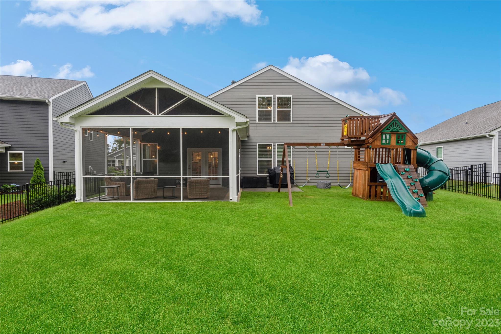 3028 Eagle Ridge Lane Indian Trail, NC 28079 - Photo 34 of 38 a front view of a house with a yard and trees