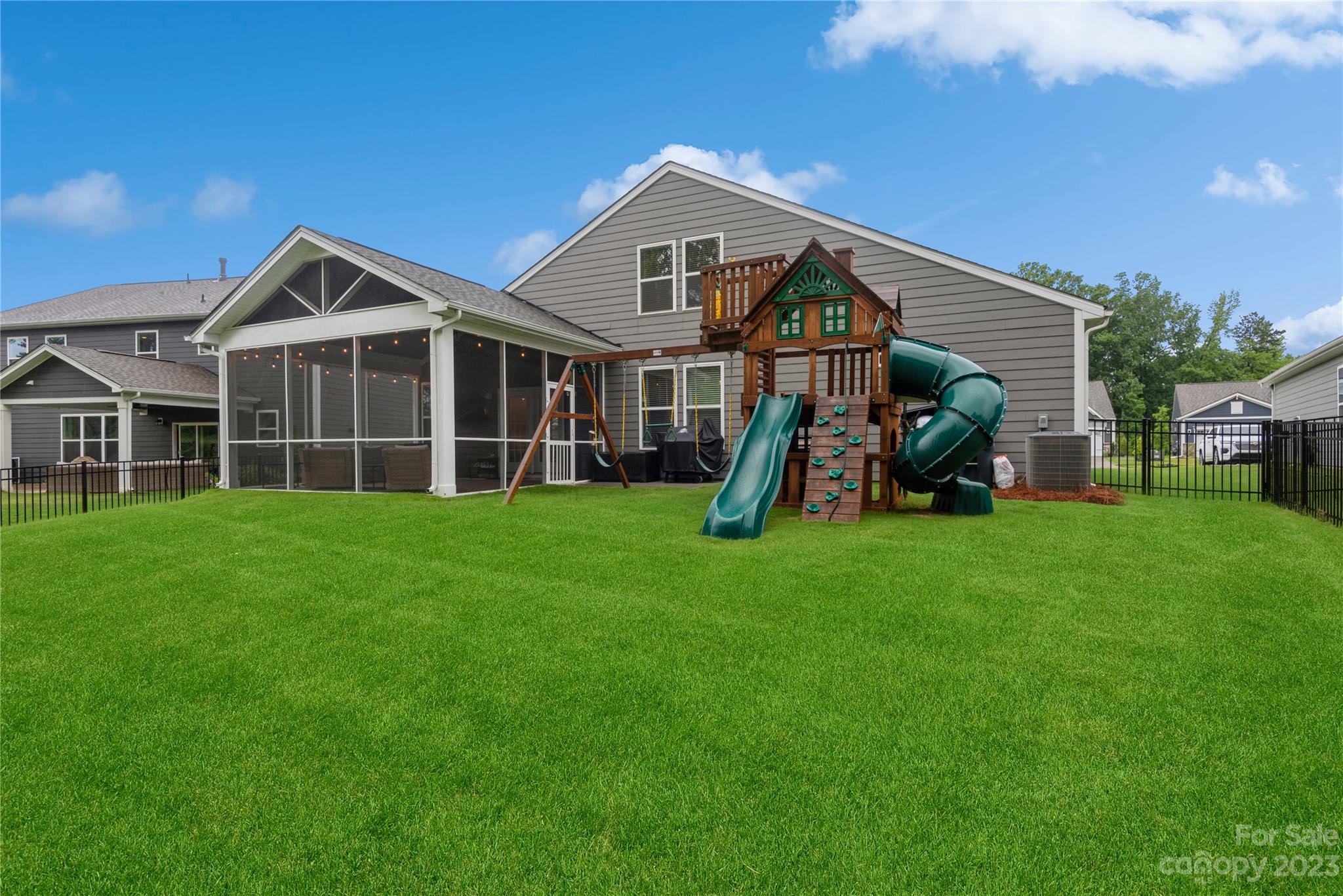 3028 Eagle Ridge Lane Indian Trail, NC 28079 - Photo 35 of 38 a front view of a house with a yard and green space