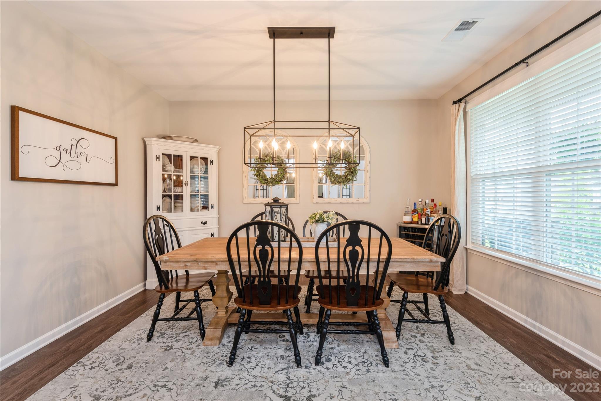 3028 Eagle Ridge Lane Indian Trail, NC 28079 - Photo 4 of 38 a view of a dining room with furniture window and wooden floor