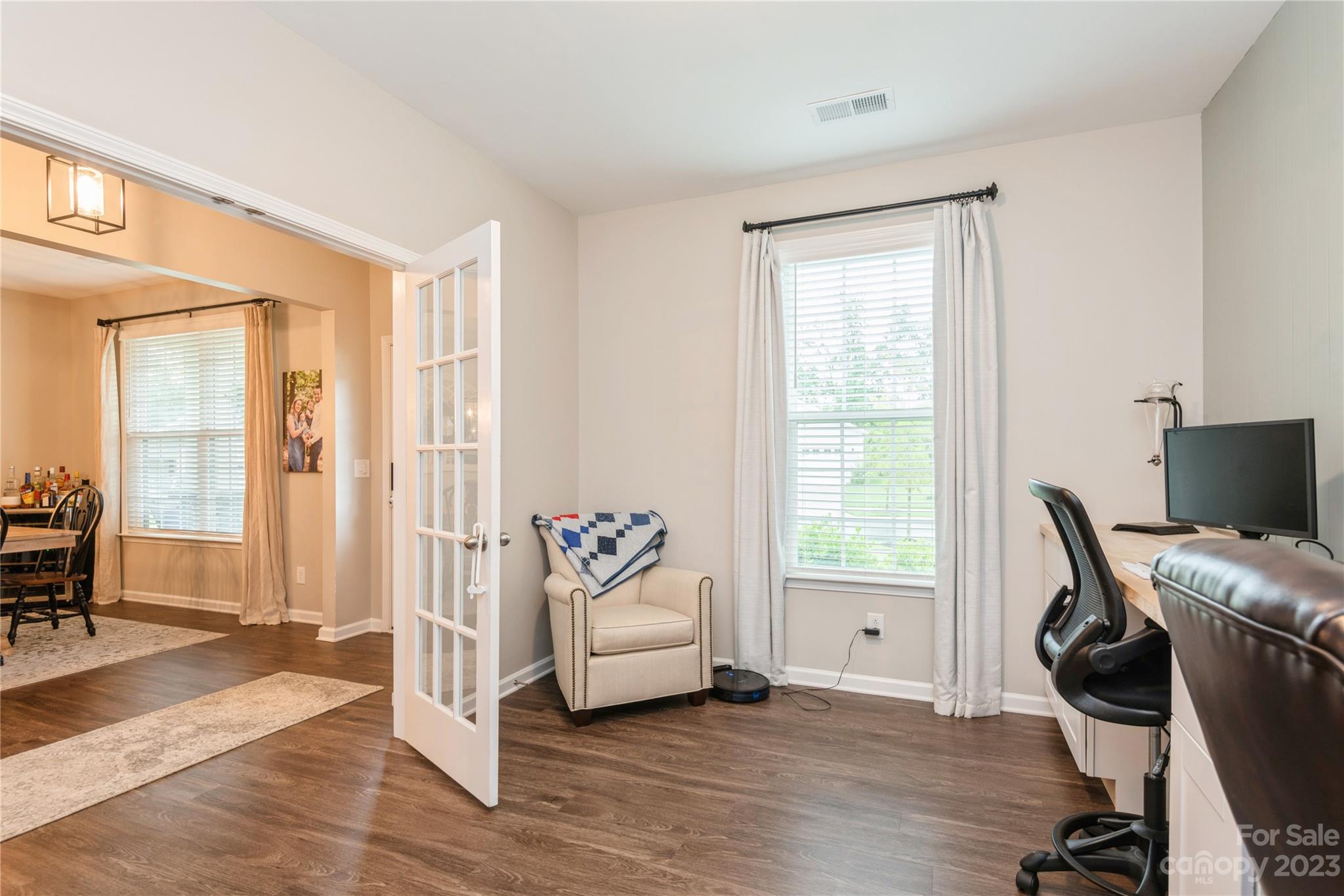 3028 Eagle Ridge Lane Indian Trail, NC 28079 - Photo 6 of 38 a living room with furniture and a window