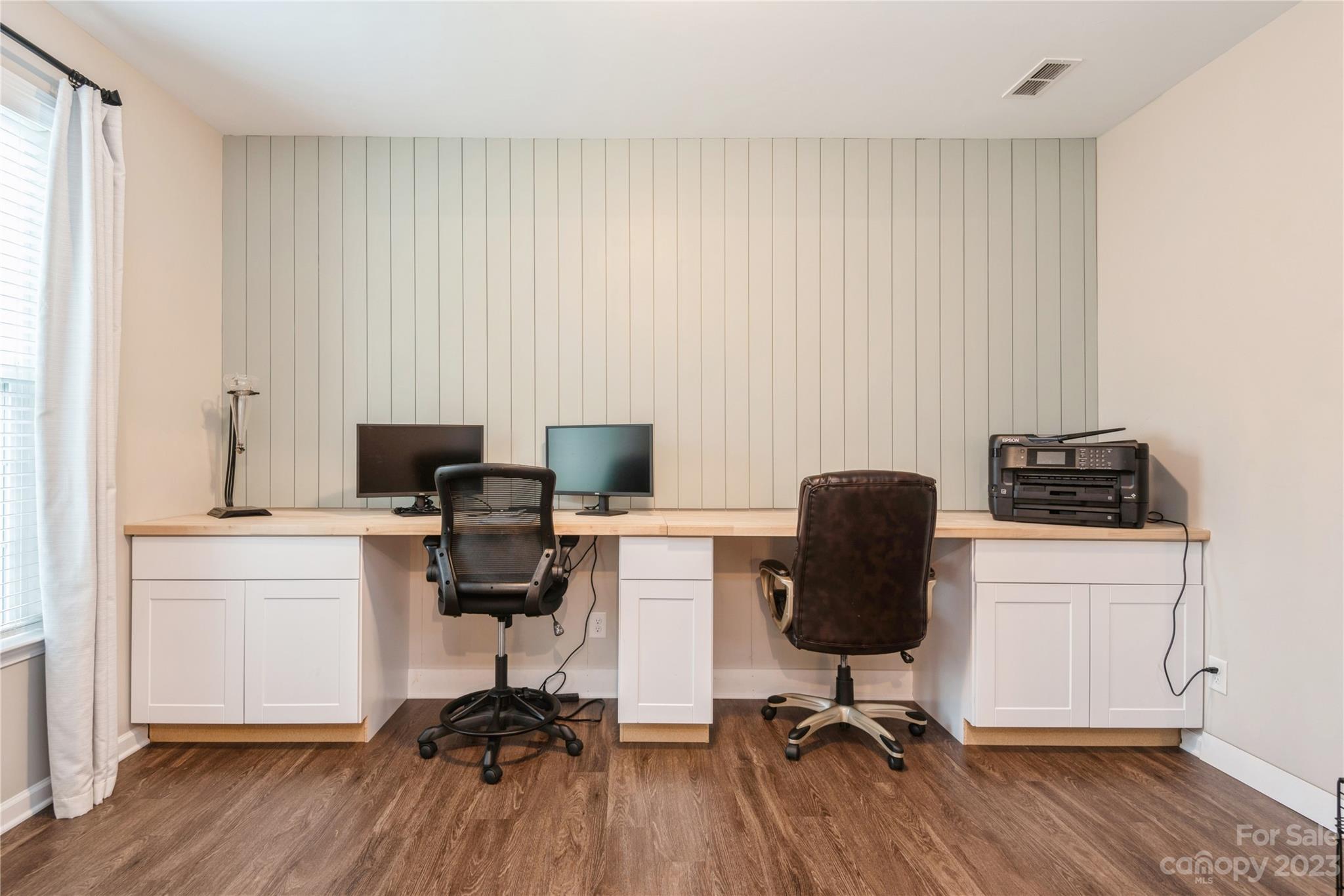 3028 Eagle Ridge Lane Indian Trail, NC 28079 - Photo 7 of 38 a view of a workspace with furniture and a window