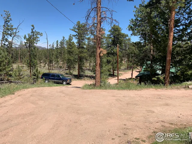 a view of road with trees