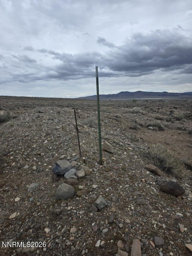 0 Shawnee Road, Unit 21 Stagecoach, NV 89429 - Photo 13 of 34 a view of a dry yard with wooden fence