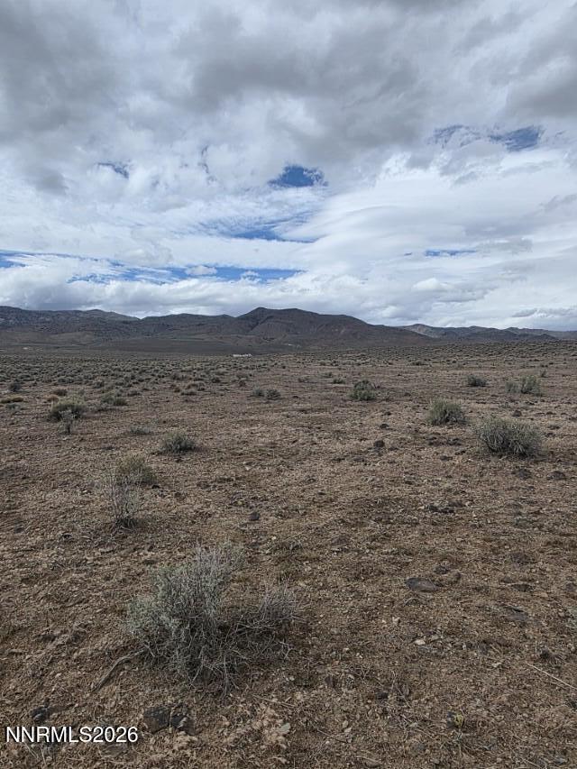 0 Shawnee Road, Unit 21 Stagecoach, NV 89429 - Photo 16 of 34 a view of a dry yard with wooden fence