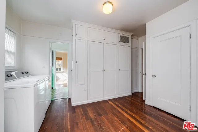 a view of a storage & utility room with wooden floor