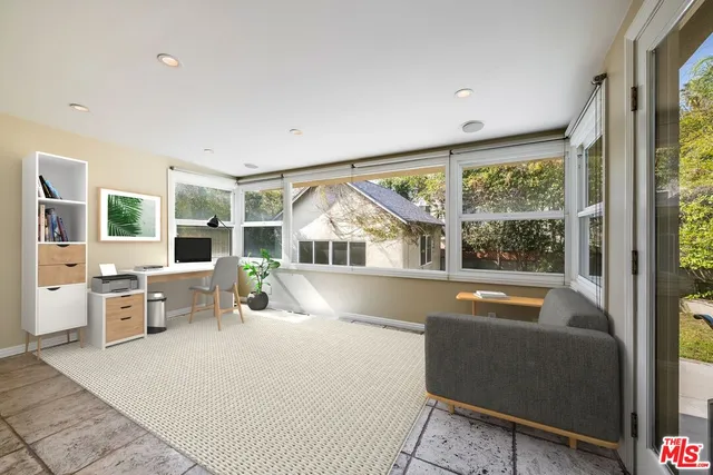 a view of room with wooden floor