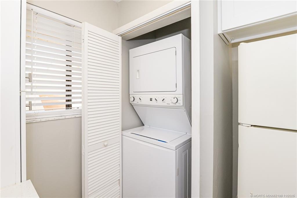 5373 Southeast Miles Grant Road, Unit C102 Stuart, FL 34997 - Photo 7 of 21 Nice stackable washer/dryer in unit!