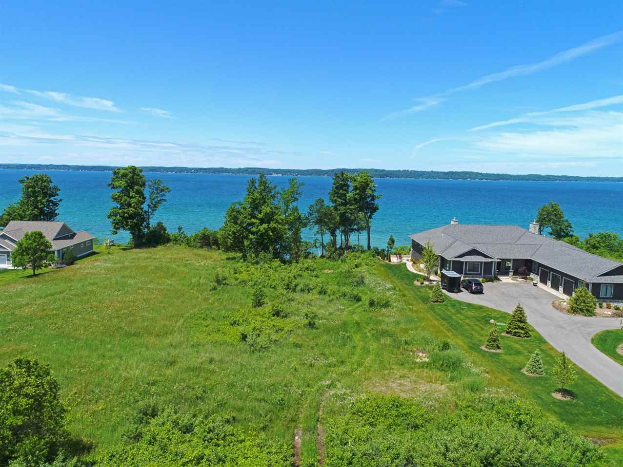 9155 Bay Ridge Drive Williamsburg, MI 49690 - Photo 3 of 16 1927382-91FFB789-D50E-4115-9CF7-BFE0A6866B0D.JPG